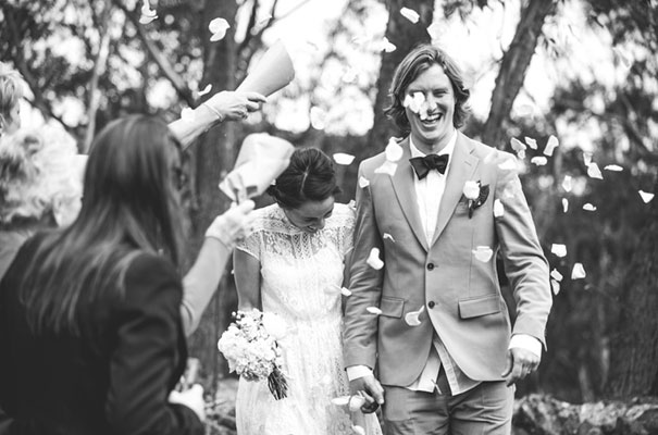 photographer-lara-hotz-country-wedding-inspiration-lace-lover-wedding-dress-bridal-gown-braids-hair-flowers-bowtie15