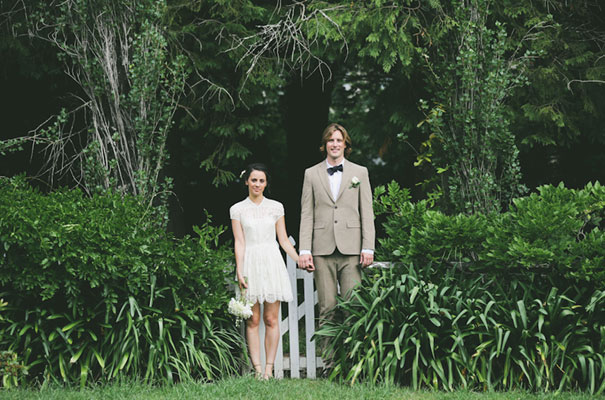 photographer-lara-hotz-country-wedding-inspiration-lace-lover-wedding-dress-bridal-gown-braids-hair-flowers-bowtie28