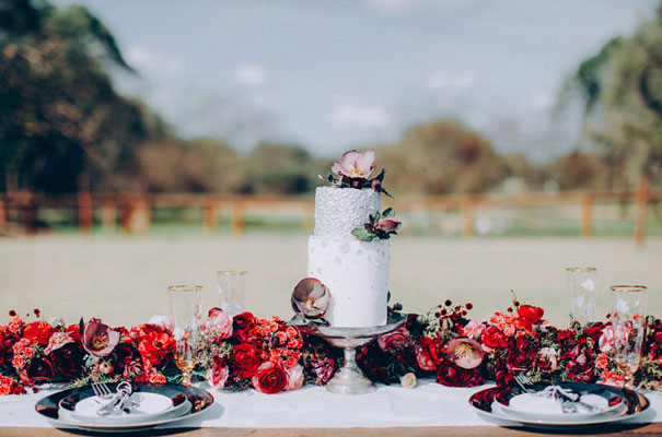 cool-black-wedding-dress-red-flowers-white-horse-floral-crown410