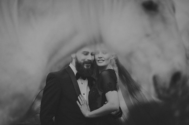 cool-black-wedding-dress-red-flowers-white-horse-floral-crown411