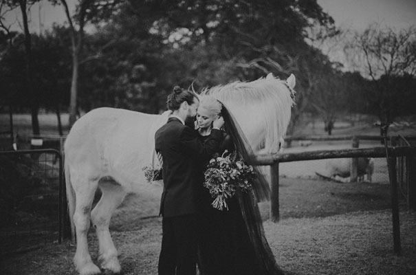 cool-black-wedding-dress-red-flowers-white-horse-floral-crown44
